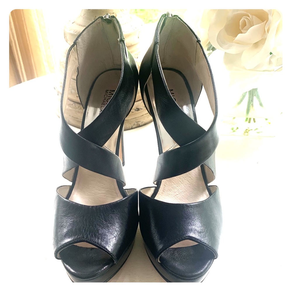 Black leather Michel Kors high heals.